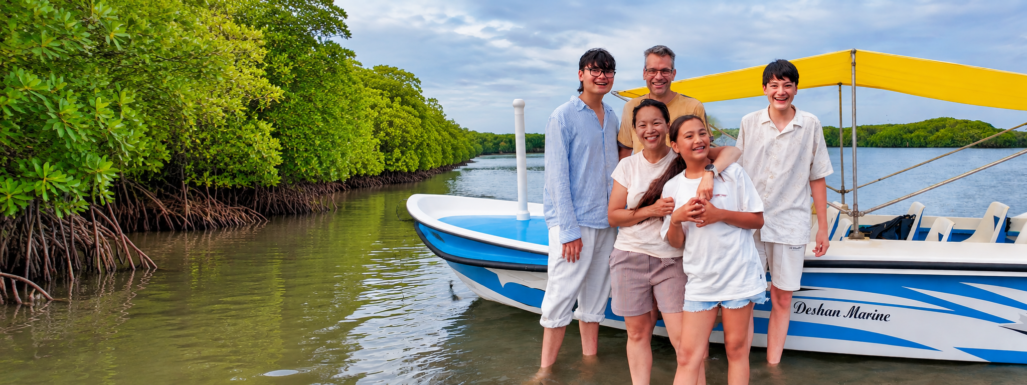 Guests enjoying a relaxed picnic boat tour on the water