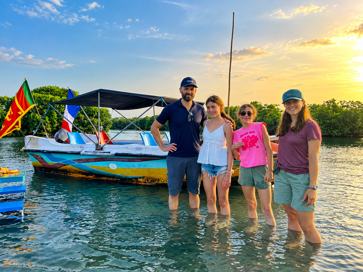 Traditional fishing village on Negombo Lagoon — local fishermen and boats on the waterway during guided tour Sri Lanka